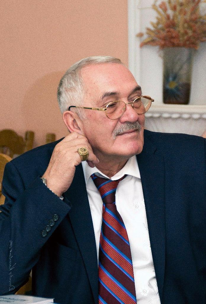 vladimir megre the author of the ringing cedars of russia (anastasia) books in his office wearing a suit