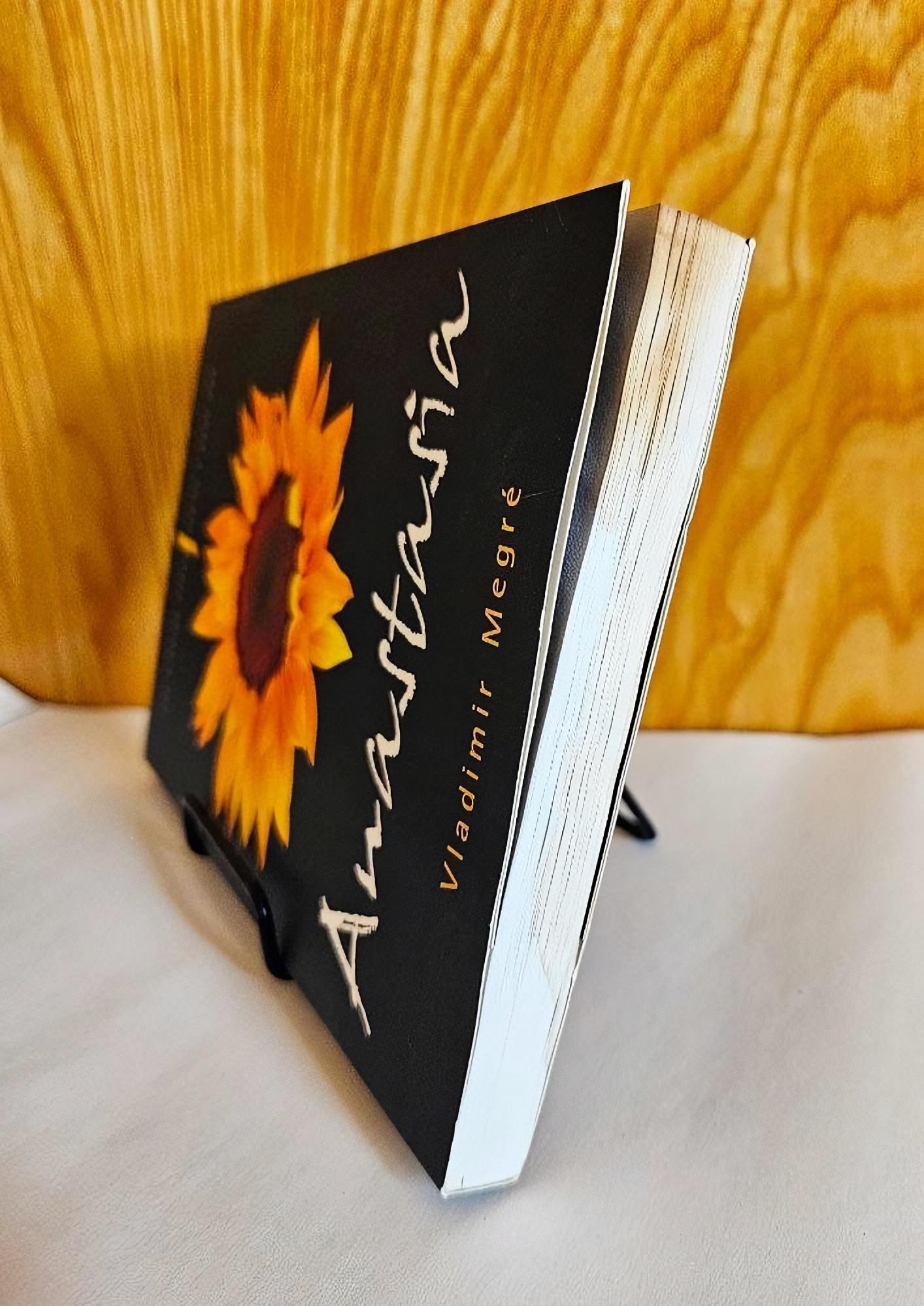 anastasia book 1 2nd edition view from bottom with water marks visible on pages - imperfect warehouse copy